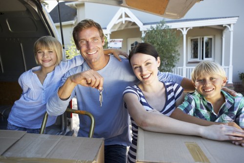Various types of furniture being handled by experts