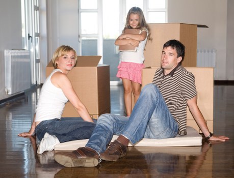 Professional movers handling household items
